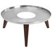 A round stainless steel and faux wood display stand with a hole in the middle.