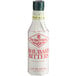 A white Fee Brothers bottle of rhubarb bitters with red text.