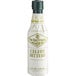 A white bottle of Fee Brothers Celery Bitters with a green and white label.