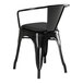 A Lancaster Table & Seating black metal arm chair with a black cushion.