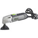 A grey and black Genesis oscillating tool with a round attachment on a table.