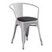 A Lancaster Table & Seating gray metal chair with black cushion.