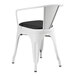 A Lancaster Table & Seating white arm chair with black vinyl cushion.