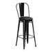 A Lancaster Table & Seating black barstool with a black cushion.