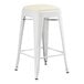 A white Lancaster Table & Seating backless counter height stool with a white cushion