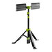 A black and green PowerSmith Voyager tripod with a light on it.