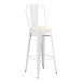 A white Lancaster Table & Seating metal bar stool with a white cushion.