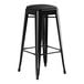 A Lancaster Table & Seating black bar stool with a black cushion.