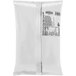 A white plastic bag of The Frozen Bean Pure Milk Bubble Tea Frappe Mix with black text.