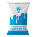 A white and blue bag of The Frozen Bean Cookies & Cream Soft Serve Mix.