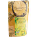 A brown bag of Davidson's Organic Mao Jian Jasmine Loose Leaf Tea with a green and white label.
