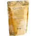 A brown Davidson's Organic Ginger Spice Herbal Loose Leaf Tea bag with text and leaves on it.