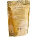 A brown bag of Davidson's Organic Peach Apricot Essence Loose Leaf Tea with text and leaves on it.