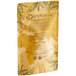 A brown and yellow Davidson's Organic Spring Cup Loose Leaf Tea Blooms package on a counter.