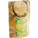 A brown Davidson's Organic Tulsi Hibiscus Flower tea bag with green and yellow label.