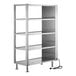 A stainless steel ServIt heated shelf warmer with shelves and a power cord.