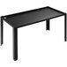 A black rectangular table with legs holding a black Abert Domino buffet podium.