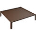 A brown metal table with a copper metal base with legs and a square metal tray on top.