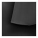A close-up of a black rubber mat with a patterned surface.