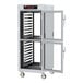 A Metro C5 8 Series heated holding cabinet with clear glass Dutch doors.
