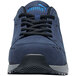 A navy Puma Airtwist Low men's athletic shoe on a table.
