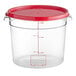A Vigor clear plastic food storage container with a red lid.