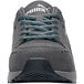 A gray and blue Puma Airtwist low athletic shoe with a non-slip sole.