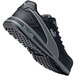 A black and grey Puma men's athletic shoe with a composite toe.