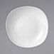 A Dudson Organic white china bowl with a wobbly rim.