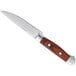 A Oneida stainless steel steak knife with a wood handle.