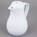 A Vollrath white plastic beverage server with a lid and a handle.