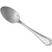 A Sant'Andrea Rossini stainless steel serving spoon with a handle.