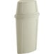 A beige plastic Lavex corner round trash can with a beige push door lid.