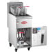 An Avantco stainless steel gas floor fryer with a door open.