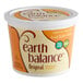 A case of 6 containers of Earth Balance Original Buttery Spread on a counter.