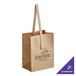 A brown paper bag with handles.