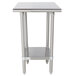 A silver metal Advance Tabco work table with an undershelf.