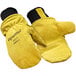 A pair of gold leather mittens with insulation.