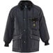A navy RefrigiWear jacket with a fur collar.