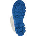 A close up of a Tingley Steplite X white and blue boot with a blue sole.
