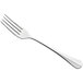 An Amefa stainless steel dessert fork with a silver handle.