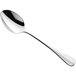 An Amefa stainless steel dessert spoon with a silver handle.