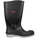 A black Tingley Pulsar knee boot with a white sole and red logo.