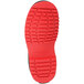 The red sole of a Tingley Workbrutes overshoes.