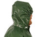 A man wearing a Tingley green Iron Eagle hood