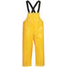 A yellow Tingley Iron Eagle overalls with black straps.