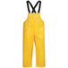 A yellow Tingley Iron Eagle overalls with black straps.
