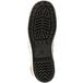 The black sole of a Tingley Pylon brick red waterproof boot.