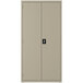 A grey steel Hirsh Industries wardrobe cabinet with black handles and two doors.