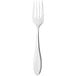 A silver Libbey salad fork with a white handle on a white background.